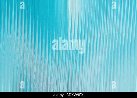 Abstract turquoise and blue gradient background with vertical blurred lines creating a soft texture Stock Photo
