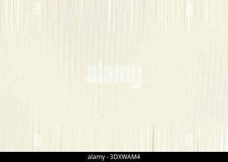 A subtle beige texture creates a versatile and neutral background with a fine, grainy pattern Stock Photo