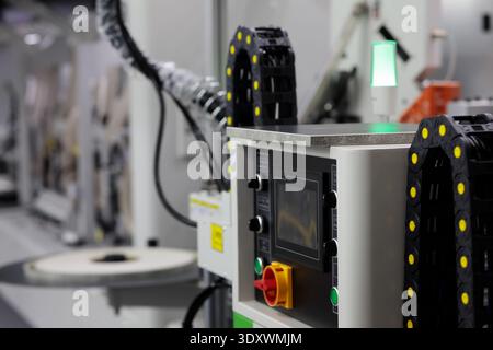 Touchscreen control console of automatic edge bander machine. Selective focus. Stock Photo
