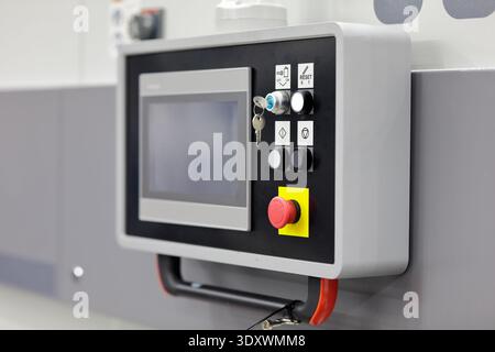 Modern control console of industrial automatic equipment. Selective focus. Stock Photo