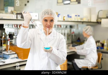 Portrait of young woman lab technician working Stock Photo