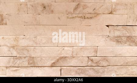 Luxurious beige marble stone wall texture perfect for elegant interior design and architectural projects Stock Photo