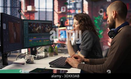 Video editors team working with AI chatbot and montage maker software, editing a background video and mixing clips on dual monitors. Professional man and woman in creative process. Camera A. Stock Photo