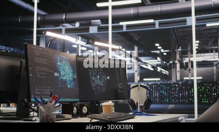 Monitors displaying status of data center hardware supporting AI training workflows and automated infrastructure systems. PC screens tracking servers processing machine learning datasets Stock Photo