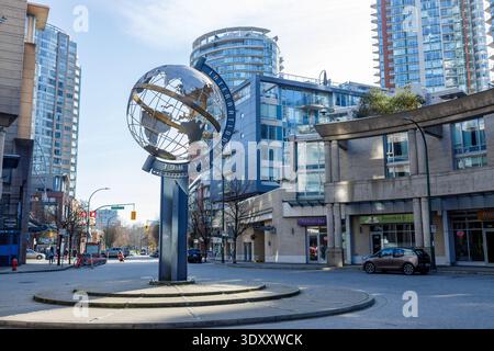 Vancouver, Canada - March 2,2026: Globe sculpture on pedestal at International Village plaza in downtown Vancouver, wireframe metal showing continents Stock Photo