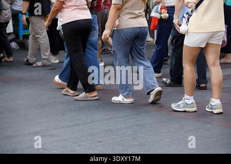 BANGKOK, THAILAND-Feb 15, 2026: Daily commute, routine city travel, city in motion with pedestrian activity, high angle view Stock Photo