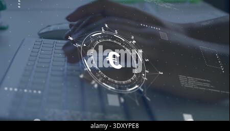 Typing adult hands with dark sleeves on laptop keyboard at desk, with Euro hologram and mouse Stock Photo