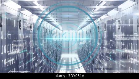 Showing central server aisle featuring perforated racks and visible binary overlay in data center Stock Photo