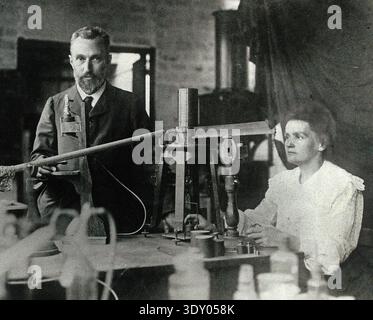 Marie and her man Pierre Curie in the laboratory. Around 1904 Marie Curie was a chemist and physicist of Polish descent. She coined the term â€œradioa Stock Photo