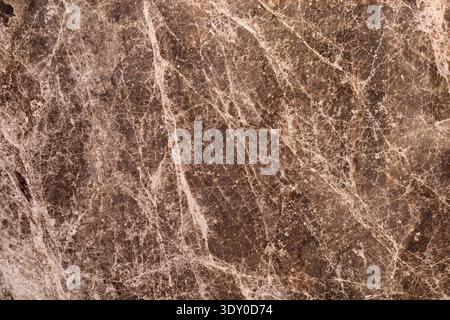Old brown marble wall texture. Abstract textured background Stock Photo