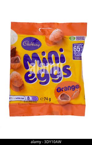 bag of cadbury orange mini eggs on white background Stock Photo
