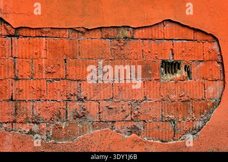 Old weathered brick wall surface suitable for organic branding, sustainability banners, or mindful backgrounds. High contrast texture adds authentic r Stock Photo