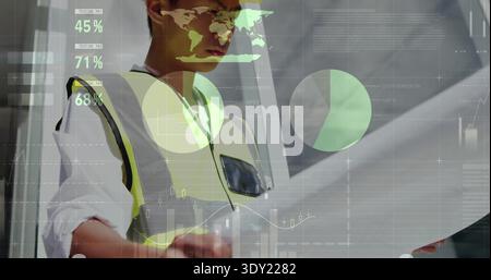 Inspecting engineer wearing hi-vis vest studying plans at construction office, with AR graphics. Blueprints, data, analytics, overlay, glass, analyzin Stock Photo