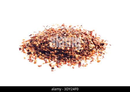 Chili pepper chopped pile, isolated on white background. Stock Photo