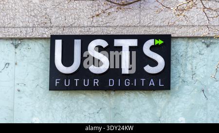 Sign and logo on the USTS headquarters, Paris, France. USTS is a French innovative web agency specializing in digital transformation Stock Photo