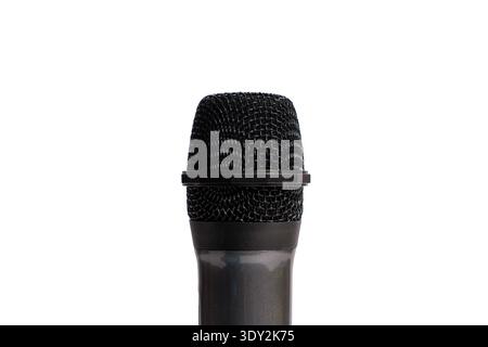 Detailed close up of a microphone head with metal mesh grille. Professional audio equipment photographed in studio light. Stock Photo