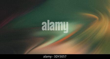 Abstract swirling blend of deep emerald green, warm orange, and subtle pink hues creates a dynamic and energetic visual texture with a grainy finish Stock Photo