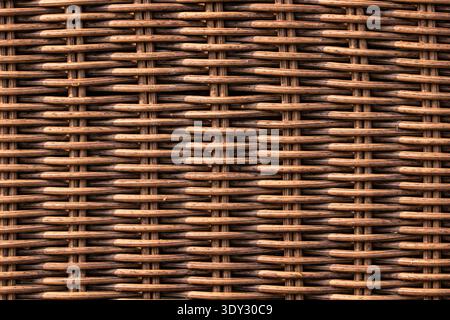 Wicker rattan weaving pattern creating textured background and natural design Stock Photo