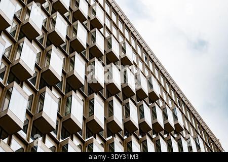 Modern brutalist architecture featuring geometric pattern on a building facade Stock Photo