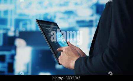 Professional IT engineer uses modern digital AI neural networks for machine learning and virtual assistant, coding for artificial intelligence brain development. Smart tech innovation. Camera A. Stock Photo