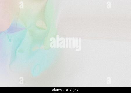 Rainbow Paper Crumpled on White Surface Stock Photo