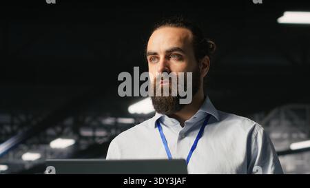 Data center admins monitoring artificial intelligence LLM visualization. Teamworking server room employees cooperating, overseeing rigs powering deep learning processes Stock Photo