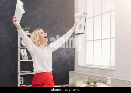 Business woman enjoying successful project Stock Photo