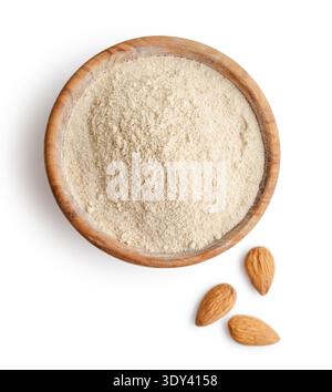 Almond flour in wooden bowl isolated on white background, top view. Clipping path included Stock Photo