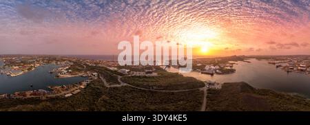 Aerial view of dramatic sunset sky over Willemstad Curacao with orange, red colors Stock Photo