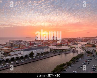 Aerial view of dramatic sunset sky over Willemstad Curacao with orange, red colors Stock Photo