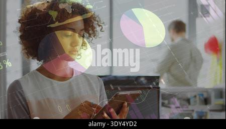 Tapping woman analyst wearing white top using smartphone in modern office, showing data overlays Stock Photo