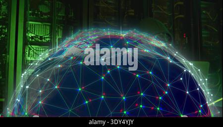 Projecting holographic globe hovering over server racks in data center, showing network nodes Stock Photo