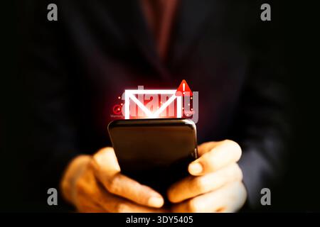 SMS spam and fake text message phishing from scammer concept Stock Photo