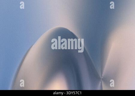 Abstract blurred image featuring shades of blue gray and white creating a soft and dreamy atmosphere Stock Photo