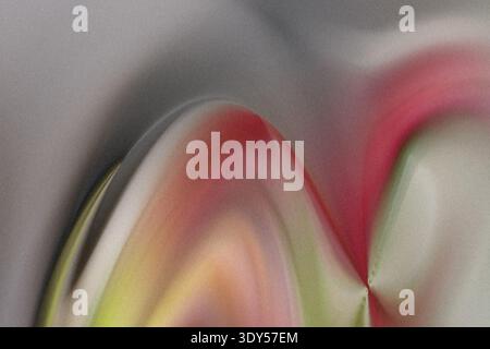 Abstract blurred image featuring a blend of colors including red green and white creating a soft effect Stock Photo