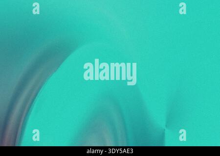 A blurry abstract image featuring a gradient of teal and turquoise colors with soft flowing textures Stock Photo