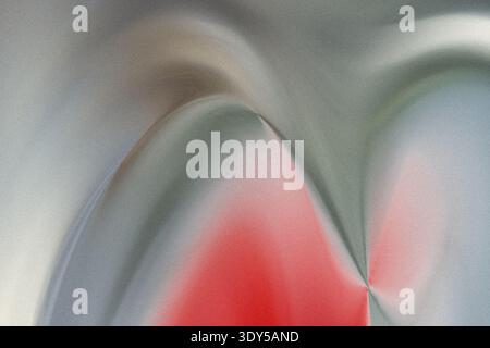Close up abstract view of a flower showing white petals and red center with blurred background effect Stock Photo