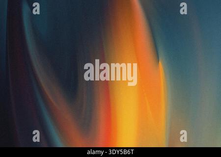 Abstract vertical gradient with orange yellow and blue hues creating a blurred and soft background effect Stock Photo