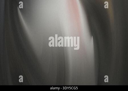 Abstract blurry image featuring shades of gray and white with soft lighting and indistinct forms visible Stock Photo