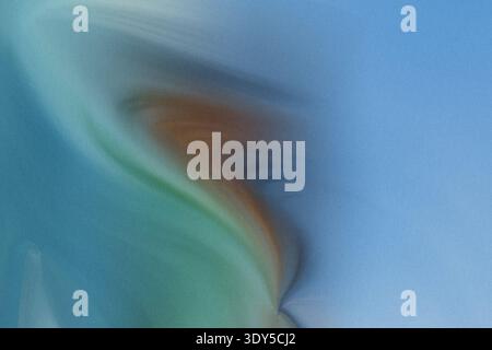 Abstract blurred background featuring shades of blue green and brown creating a soft watercolor effect Stock Photo
