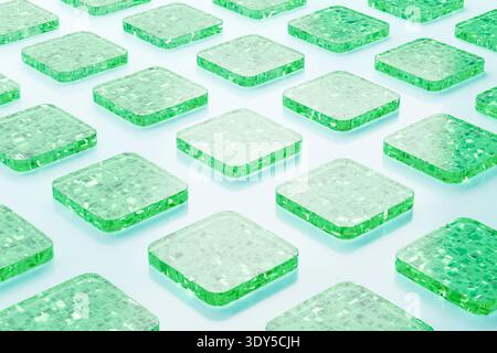 3D render of transparent green glass squares with electronic circuit patterns arranged in a repeating grid on a light background. Technology concept. Stock Photo