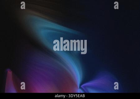 Abstract blurred background showing a gradient of blue purple and green colors with a dark background Stock Photo