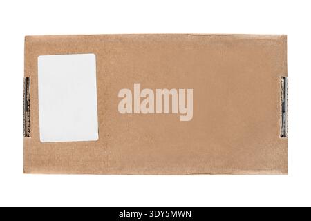 Blank craft carton packaging box with blank white sticker label isolated over white Stock Photo