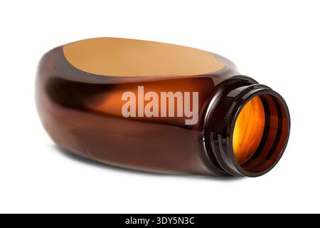 Empty brown plastic jar lying on white background Stock Photo