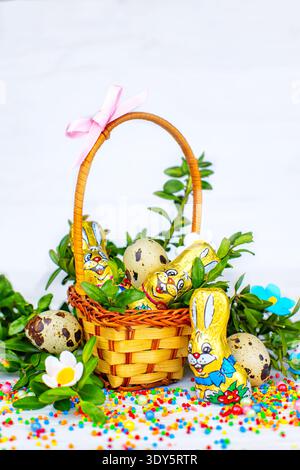 Easter composition. Easter cake and painted eggs, white flowers, festive composition in rustic style,ukrainian orthodox tradition, vintage wooden Stock Photo