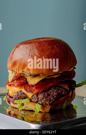 Burger on a dark background isolated with space for text Stock Photo
