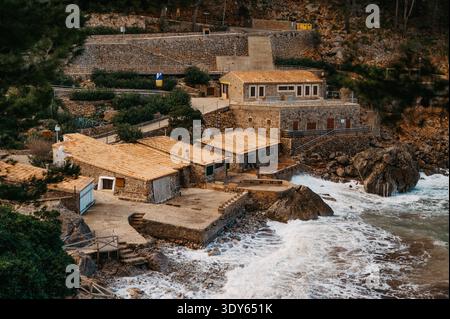 Stone houses on the waterfront at Port de Sa Calobra, Mallorca Stock Photo