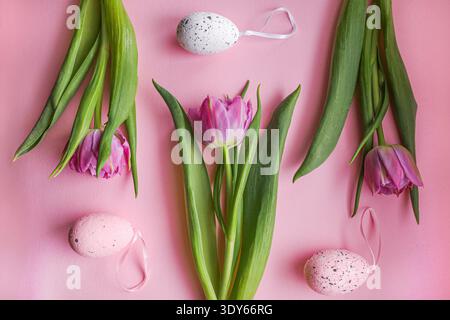 Minimal floral composition with tulips and egg decorations Stock Photo