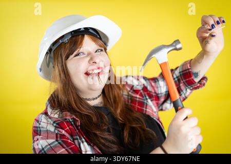 Young woman ready for do it yourself construction Stock Photo