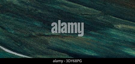 Dark teal abstract texture with golden shimmer and flowing organic wave patterns Stock Photo